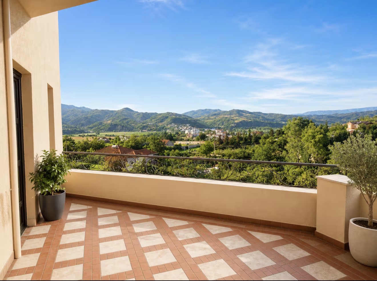 Olive trees on the balcony, valley beyond.